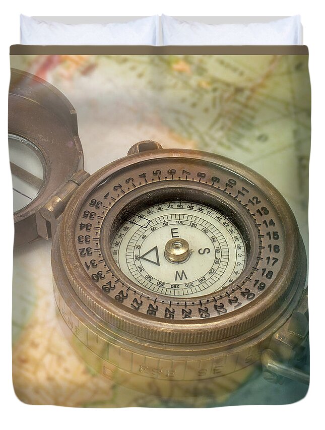 Brass Duvet Cover featuring the photograph Compass With Transparent Map by Atu Images