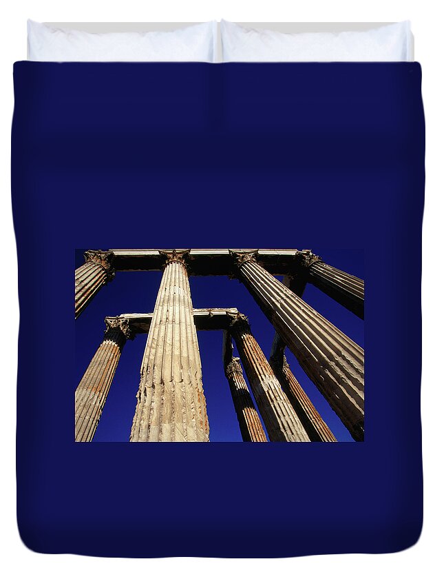 Greek Culture Duvet Cover featuring the photograph Corinthian Columns Of The Temple Of by Lonely Planet