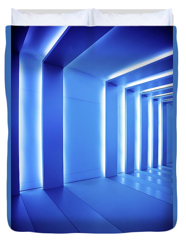 Empty Duvet Cover featuring the photograph Corridor With Blue Columns by Nikada
