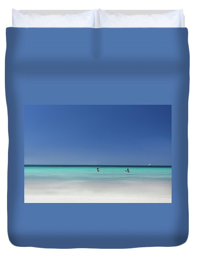 People Duvet Cover featuring the photograph Couple Playing Together In The Water At by Robert Lang Photography