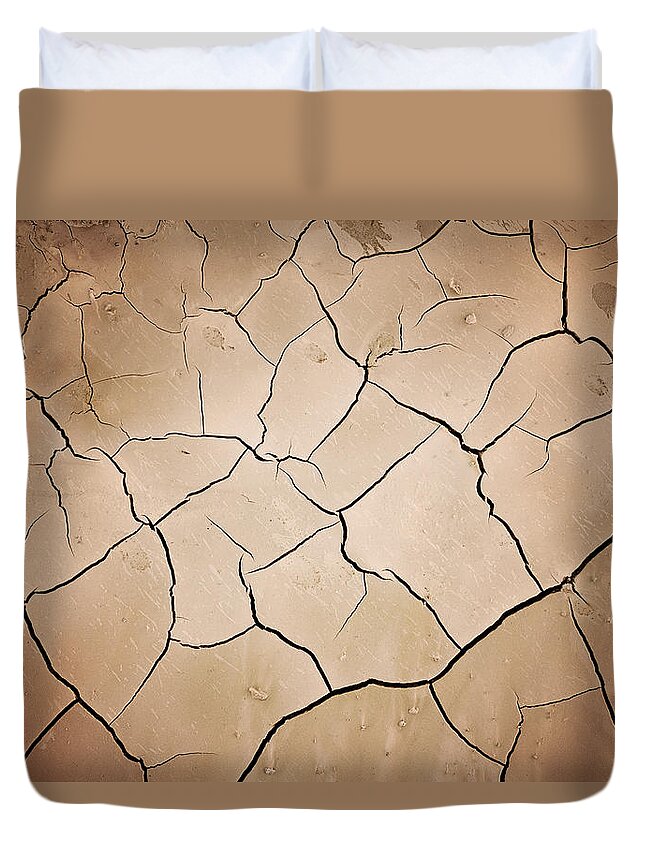 Empty Duvet Cover featuring the photograph Cracks In Dry Earth by Kertlis