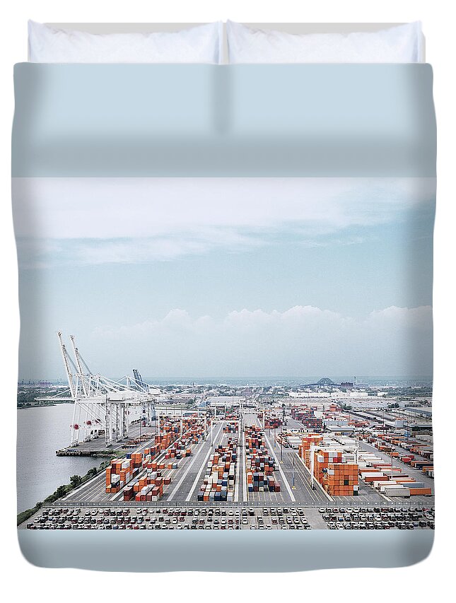In A Row Duvet Cover featuring the photograph Crane And Cargo Containers On Pier by Erik Von Weber