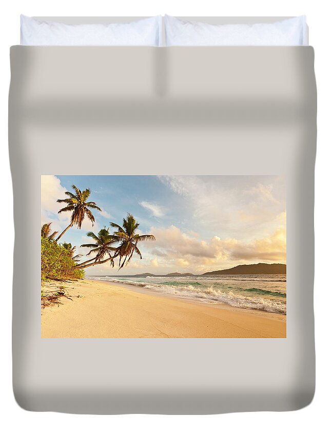 Water's Edge Duvet Cover featuring the photograph Desert Island Sunrise Idyllic Palm by Fotovoyager