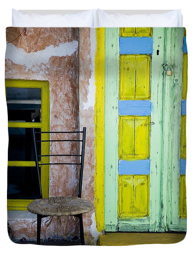 Empty Duvet Cover featuring the photograph Door Painted Yellow Blue And Green With by Rubberball/nicole Hill