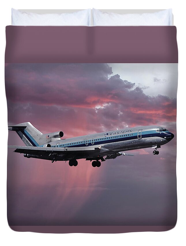 Eastern Airlines Duvet Cover featuring the photograph Eastern Boeing 727-225 Landing in a Winter Storm Sunset by Erik Simonsen