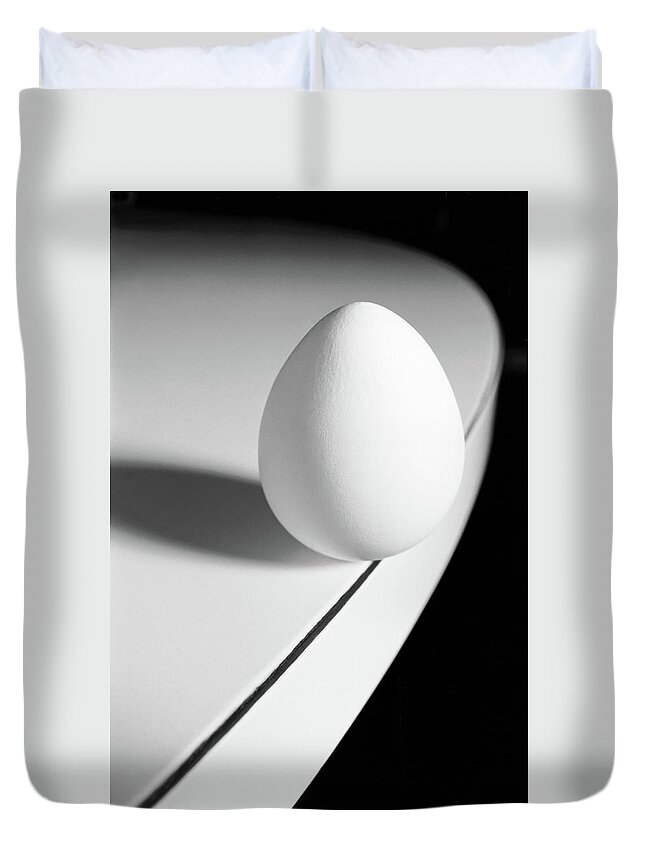 Corporate Business Duvet Cover featuring the photograph Egg Carefully Balancing At The Edge Of by Scotspencer