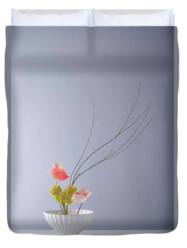 Vase Duvet Cover featuring the photograph Flower Arrangement,space Of by Ryouchin