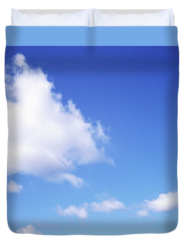 Tranquility Duvet Cover featuring the photograph Fluffy Cloud In Blue Sky by Dougal Waters