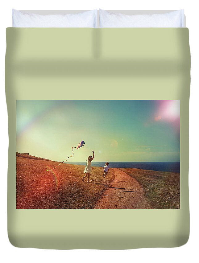 Shadow Duvet Cover featuring the photograph Flying The Kite by Carol Yepes