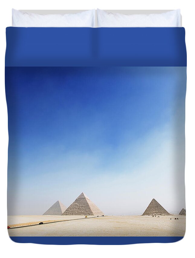 Clear Sky Duvet Cover featuring the photograph Giza Pyramids by Roine Magnusson