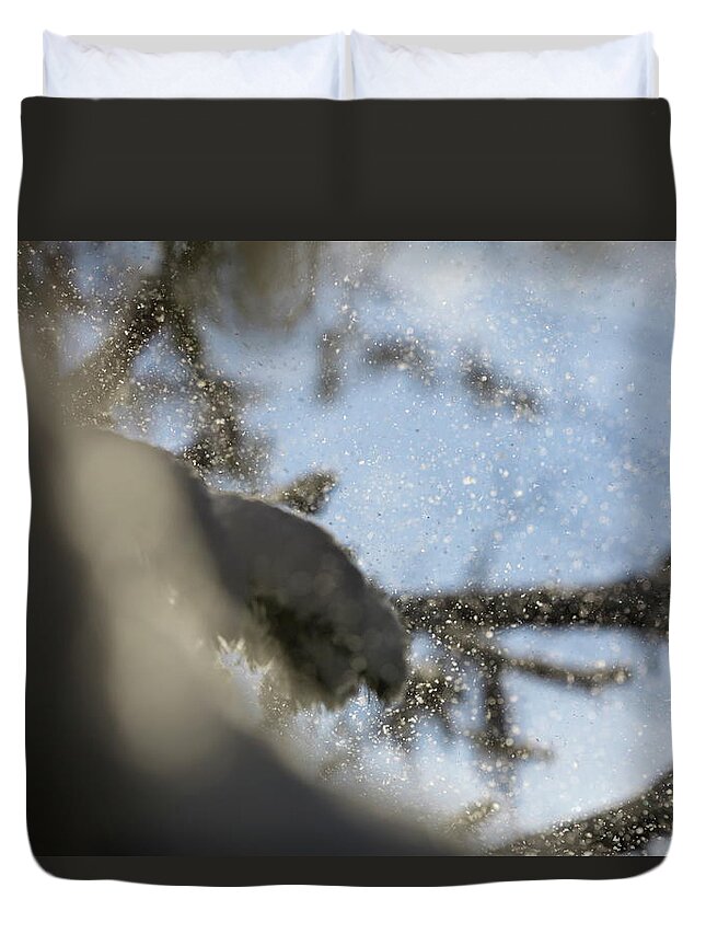 Abstract Duvet Cover featuring the photograph Gusts of snow are being blown from spruce trees by Intensivelight