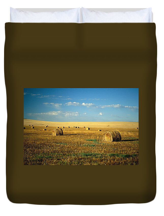 Tranquility Duvet Cover featuring the photograph Hay Field, North Dakota by Brand X Pictures