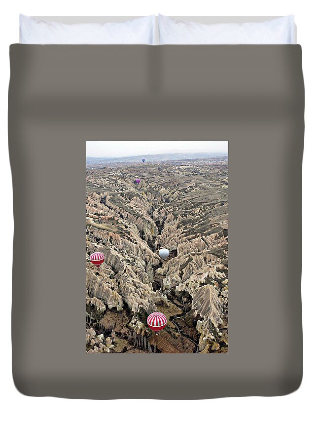 Dawn Duvet Cover featuring the photograph Hot Air Balloons Over Fairy Chimneys In by Gregory T. Smith