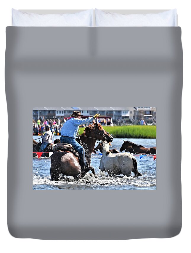 Hustling Duvet Cover featuring the photograph Hustling a Stray Wild Horse - Chincoteague Pony Run by Kim Bemis