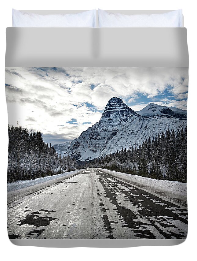 Scenics Duvet Cover featuring the photograph Ice Covered Highway Leads Towards by Aaron Black