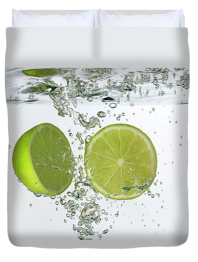 Vitamin C Duvet Cover featuring the photograph Lime Halves Submerged In Water by Photoalto/neville Mountford-hoare