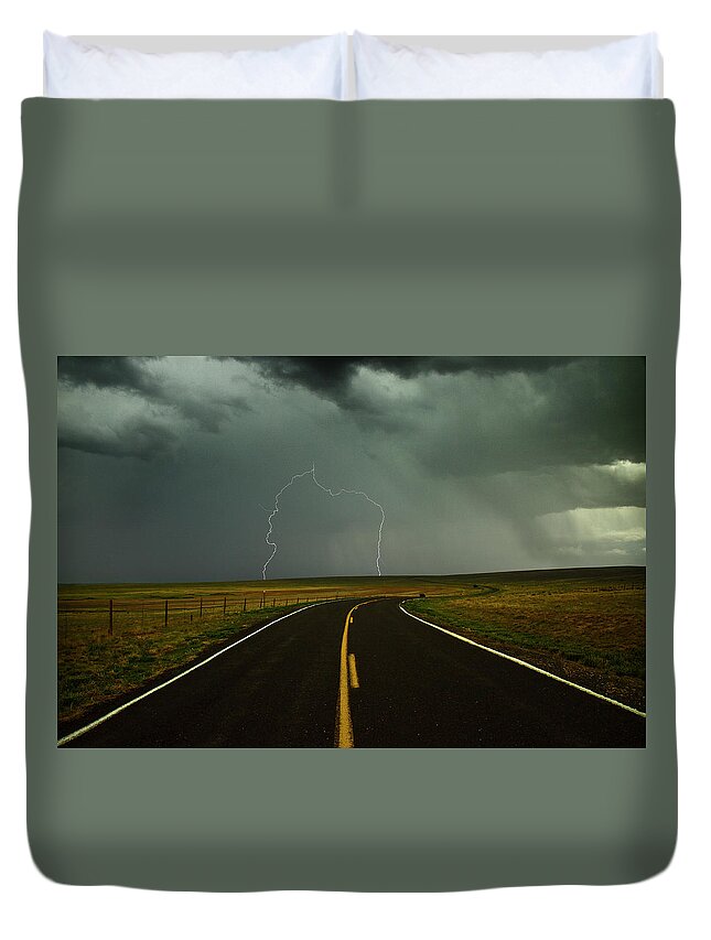 Tranquility Duvet Cover featuring the photograph Long And Winding Road Against Lighting by Davearnoldphoto.com