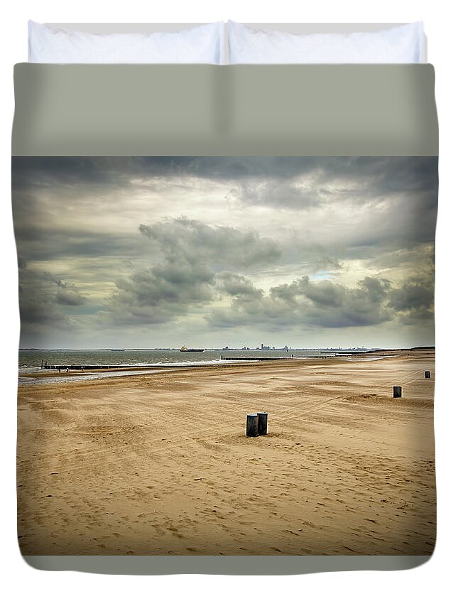 Water's Edge Duvet Cover featuring the photograph Loomy Sky Over Wide Angle Beach by Noctiluxx