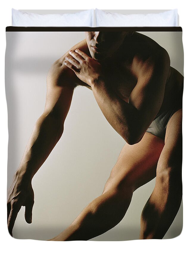 Ballet Dancer Duvet Cover featuring the photograph Male Ballet Dancer Holding Pose by Ryan Mcvay