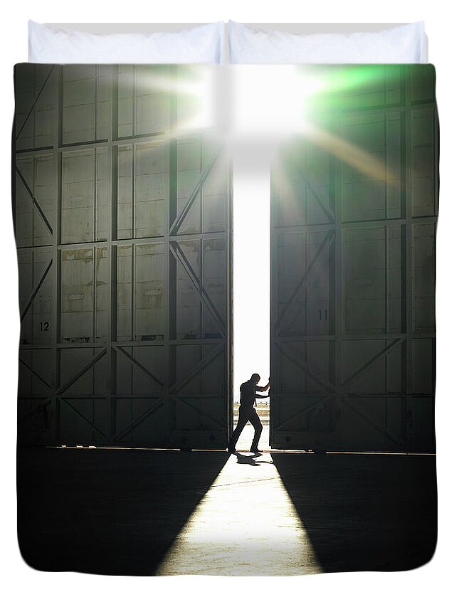 People Duvet Cover featuring the photograph Man Pushing Door Open by Ryan Mcvay