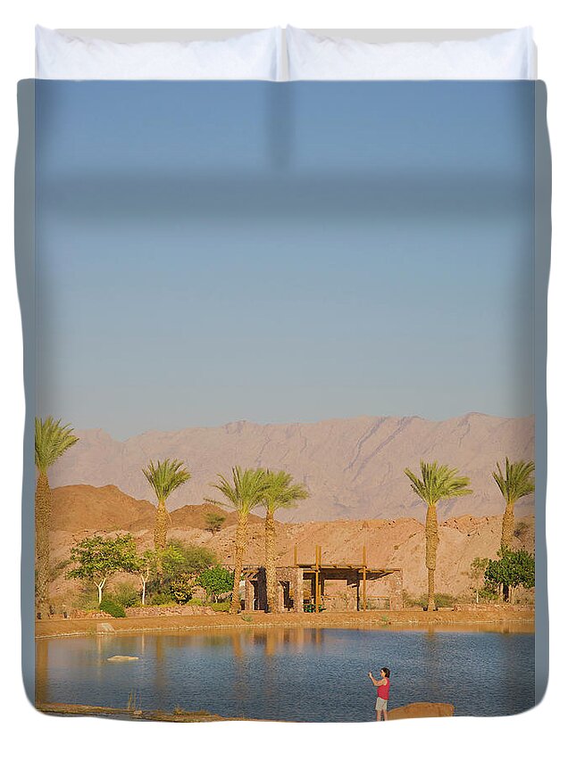 Scenics Duvet Cover featuring the photograph Mature Adult On Thin Strip Of Land Near by Barry Winiker