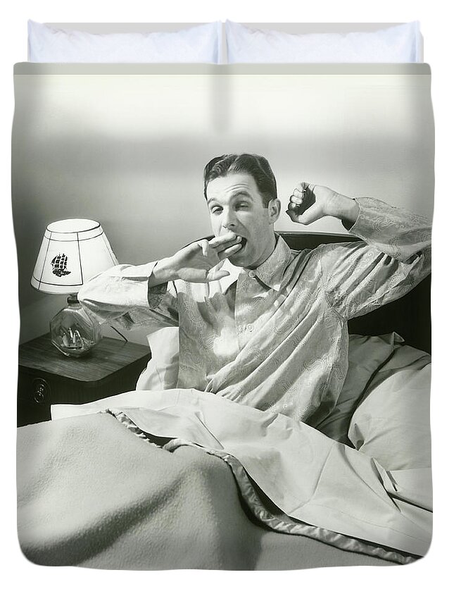 Human Arm Duvet Cover featuring the photograph Mature Man Yawning Sitting In Bed by George Marks