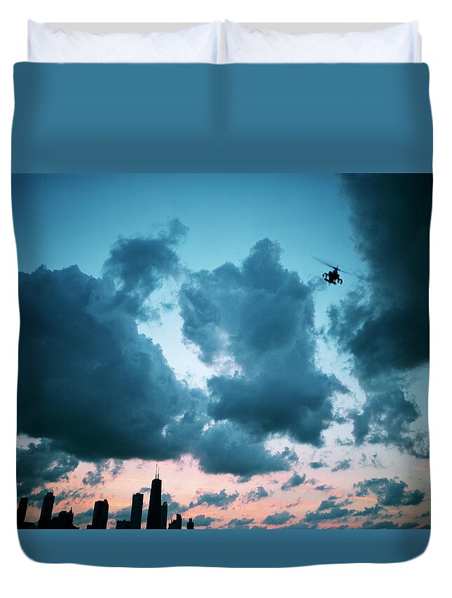 Threats Duvet Cover featuring the photograph Military Helicopter Above City by Seth Goldfarb