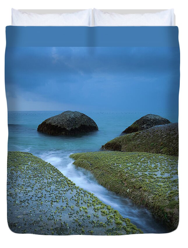 Scenics Duvet Cover featuring the photograph Moss Covered Rocks At Seashore by Andreluu