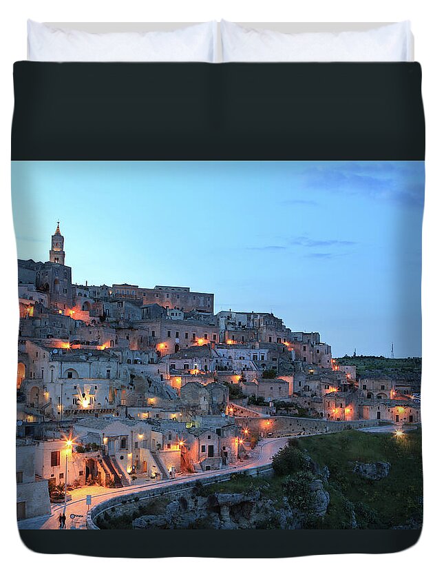 Clear Sky Duvet Cover featuring the photograph Night Cityscape View Of Matera Sassi by Romaoslo