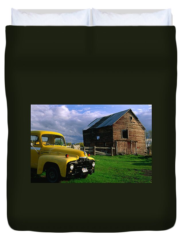Aging Process Duvet Cover featuring the photograph Old Barn And Yellow Pick-up Truck In by Lonely Planet