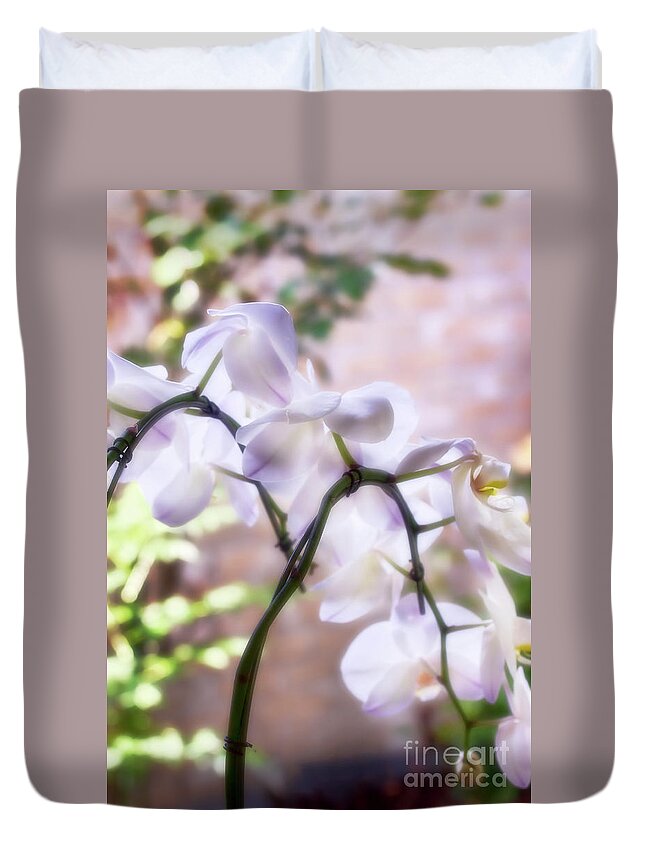 Orchids Duvet Cover featuring the photograph Orchid Garden by Joan Bertucci