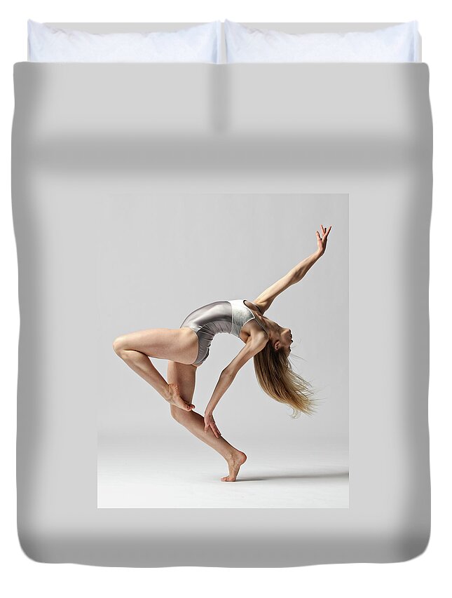 Ballet Dancer Duvet Cover featuring the photograph Passe In Motion by Copyright Christopher Peddecord 2009