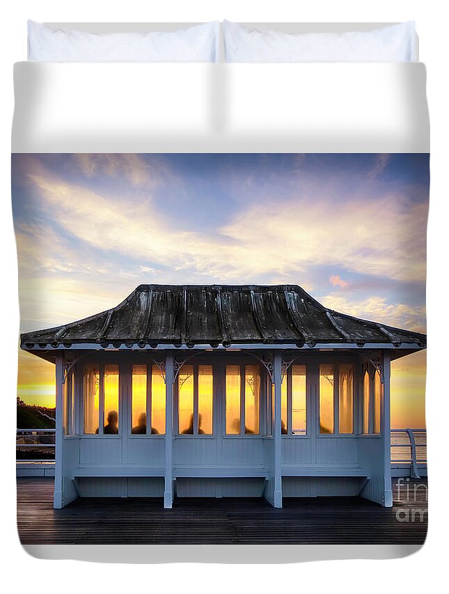 Cromer Duvet Cover featuring the photograph Cromer Pier Norfolk sunset watchers by Simon Bratt