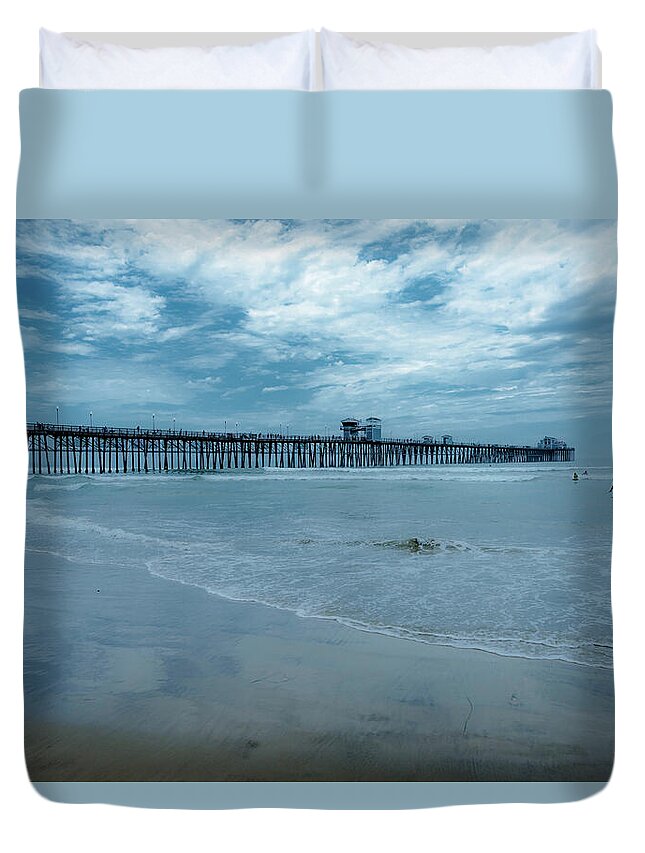 Pier Duvet Cover featuring the photograph Pier Out of the Blue by Debra Kewley