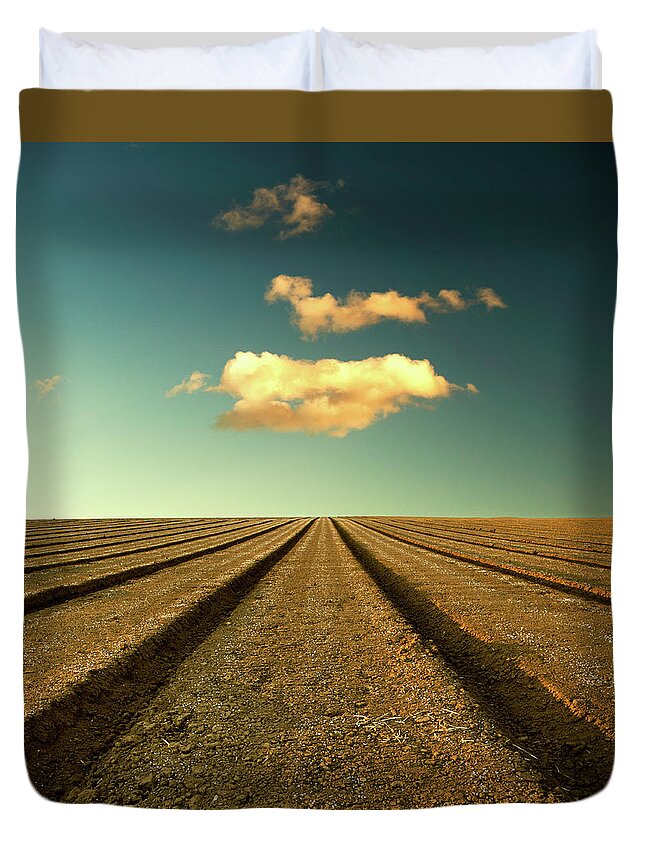 Scenics Duvet Cover featuring the photograph Ploughed Field And Sky by Paul Mcgee