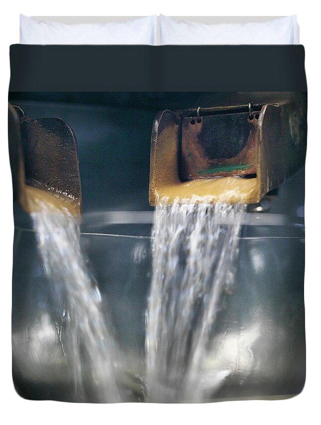 Distillation Duvet Cover featuring the photograph Pure Whisky Pouring From Stills In A by Monty Rakusen