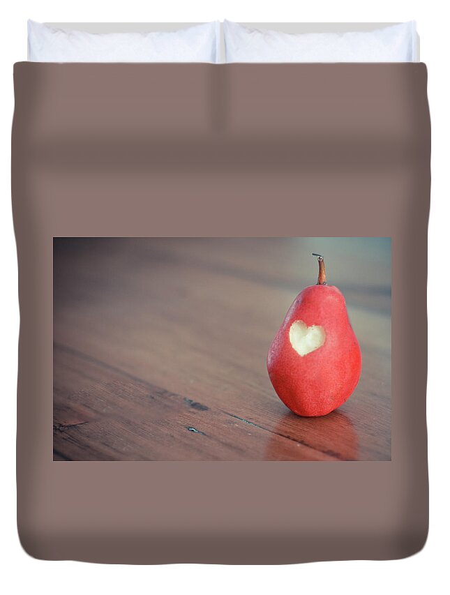 Wood Duvet Cover featuring the photograph Red Pear With Heart Shape Bit by Danielle Donders