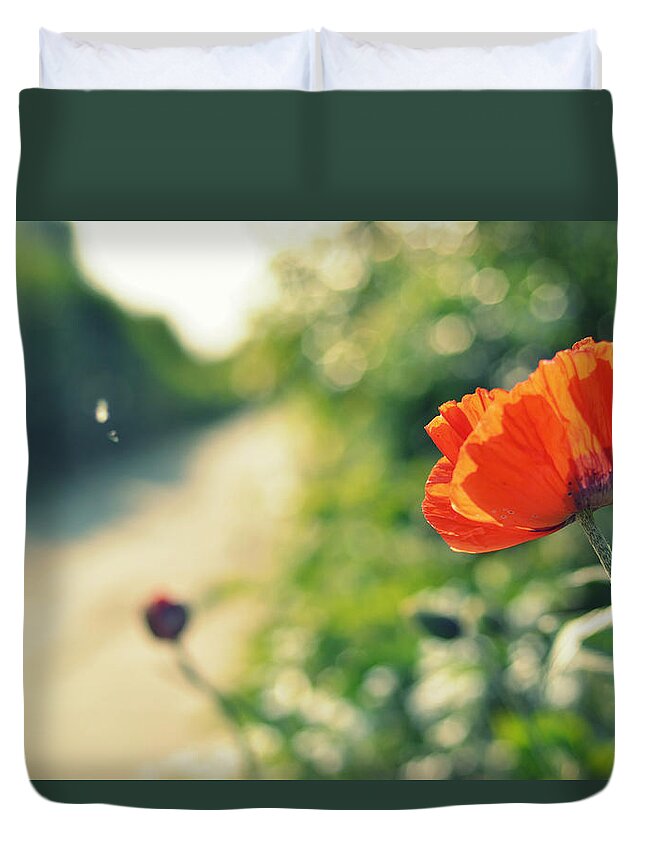 Wind Duvet Cover featuring the photograph Red Poppy Flower On Pad by Photo By Ira Heuvelman-dobrolyubova