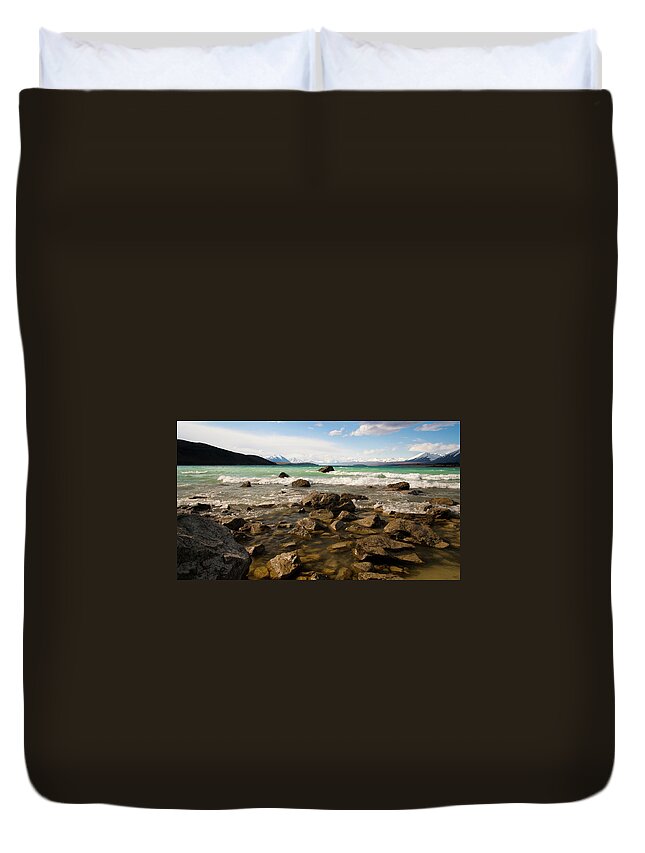 Water's Edge Duvet Cover featuring the photograph Rocky Shore Of Lake Tekapo by Megan Ahrens