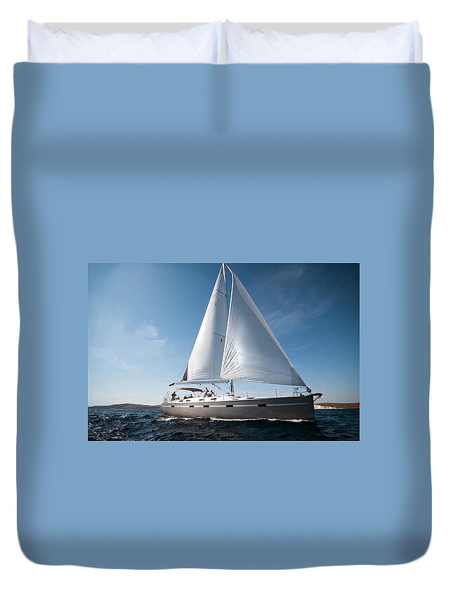 Wind Duvet Cover featuring the photograph Sailboat At Sea On A Sunny Day by 1001nights