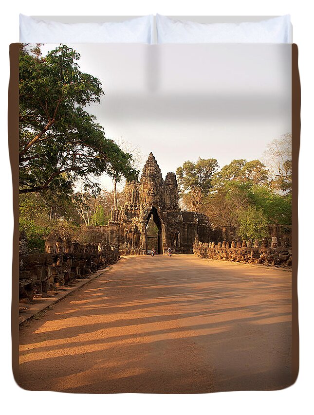Cambodian Culture Duvet Cover featuring the photograph Semi-restored Gate At Angkor Thom by Jim Simmen