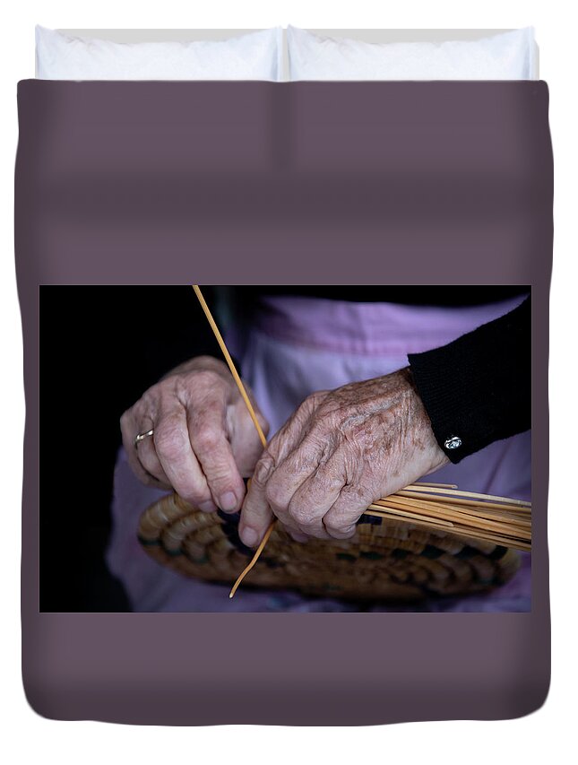 Knitting Duvet Cover featuring the photograph Senior woman knitting a traditional basket with reeds  by Michalakis Ppalis