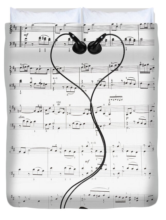 Sheet Music Duvet Cover featuring the photograph Sheet Music And Headphones by Moodboard
