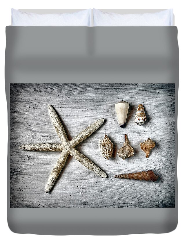 Animal Shell Duvet Cover featuring the photograph Shells And Starfish by Santiago Nuevo Peña