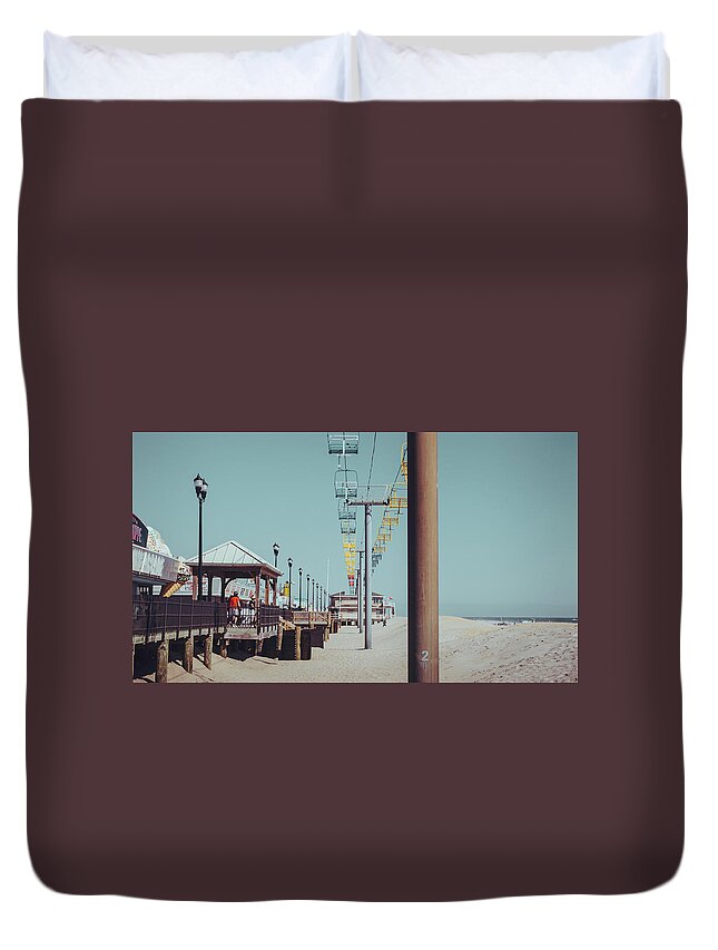 Seaside Duvet Cover featuring the photograph Sky Ride by Steve Stanger