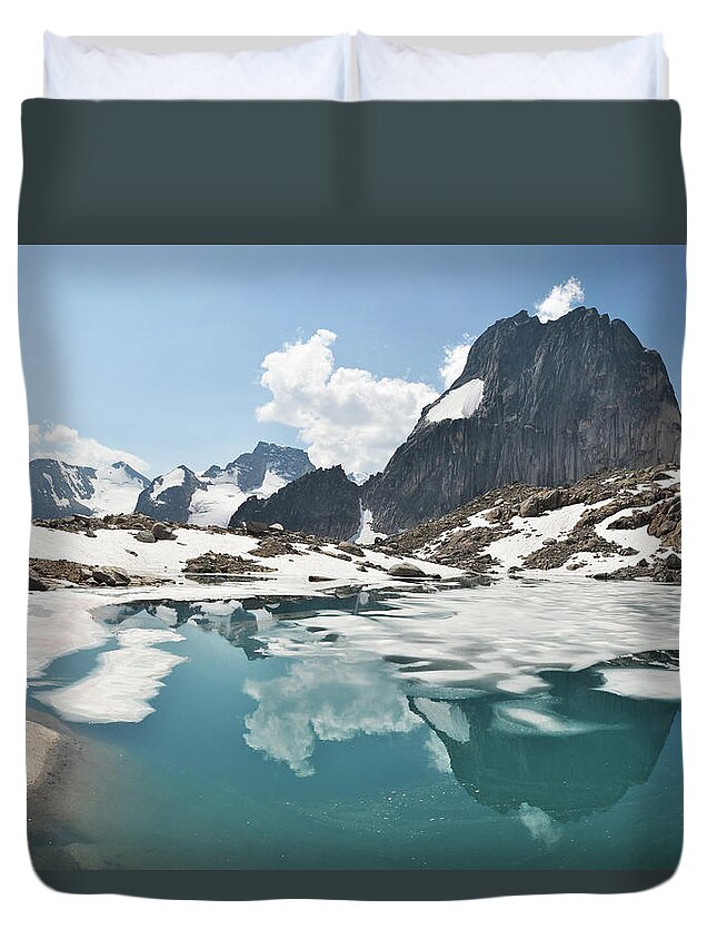 Scenics Duvet Cover featuring the photograph Snowpatch Spire by Marko Stavric Photography
