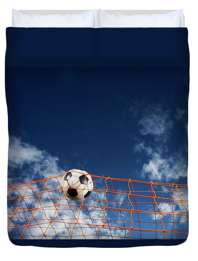 Working Duvet Cover featuring the photograph Soccer Ball Going Into Goal Net by Fuse