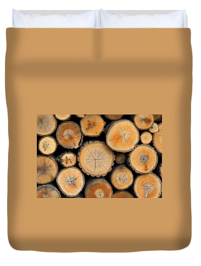 Scenics Duvet Cover featuring the photograph Stacked Logs by Sunnybeach