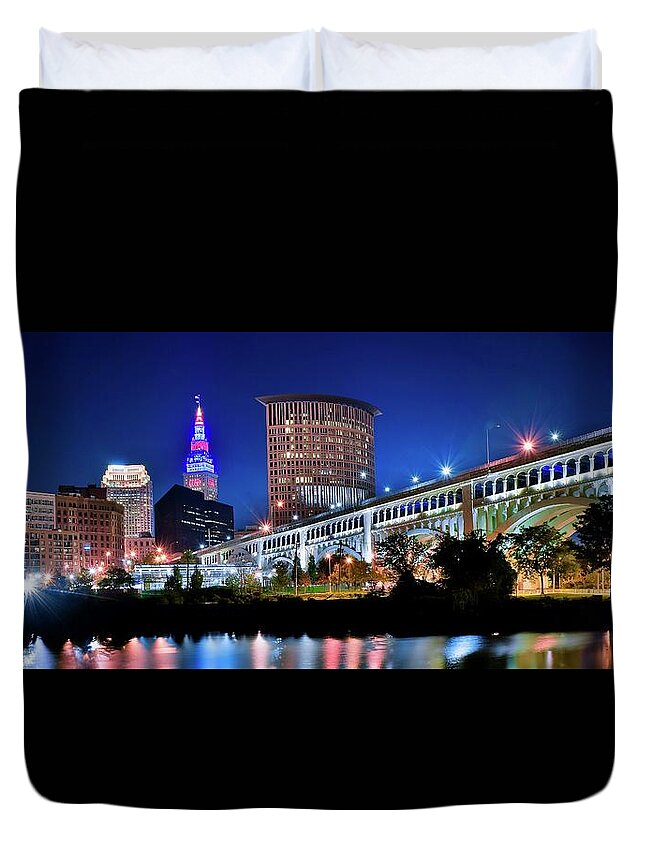 Cleveland Duvet Cover featuring the photograph Stretching out on a Colorful Night by Frozen in Time Fine Art Photography