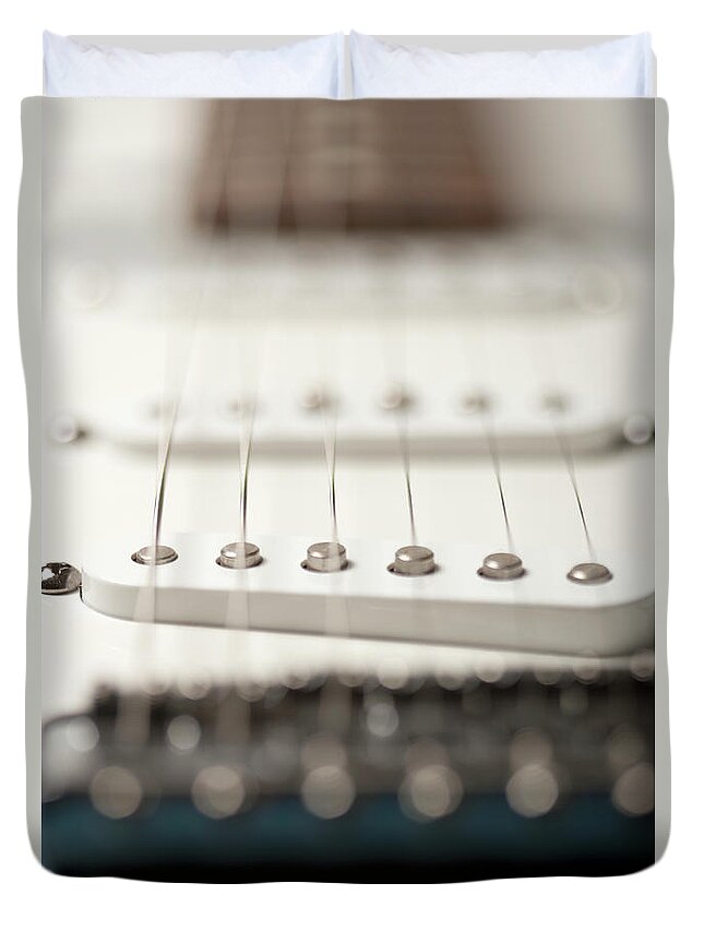Music Duvet Cover featuring the photograph String Vibrations On Electric Guitar by Stewart Waller